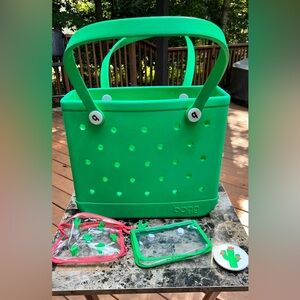 Gently used Baby Bogg Bag. Green with Envy